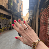 A photo of a freshly manicured hand in Europe
