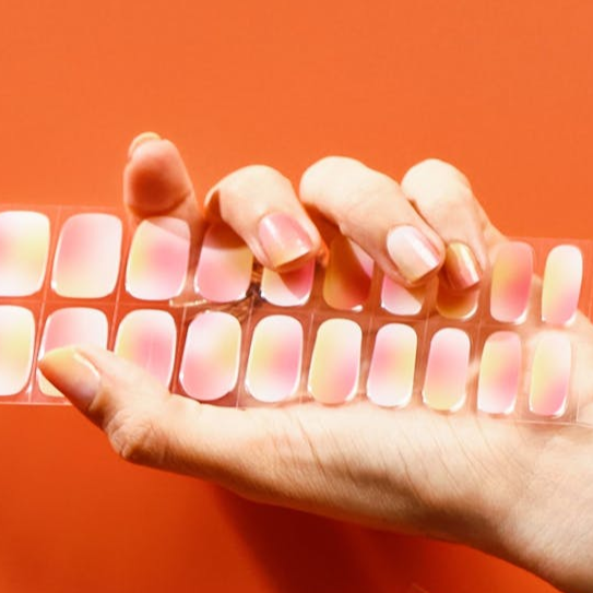 ombre pink and yellow gel manicure